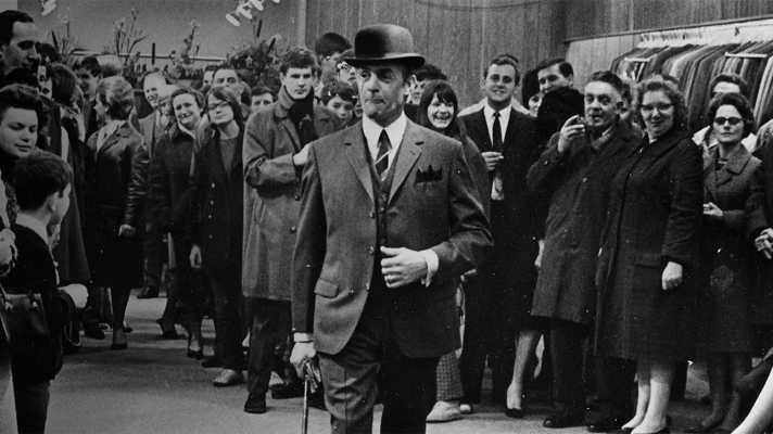Archival black-and-white photograph of a fashion presentation