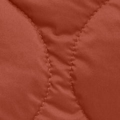 Olmetex burnt orange quilted technical fabric Inspiration