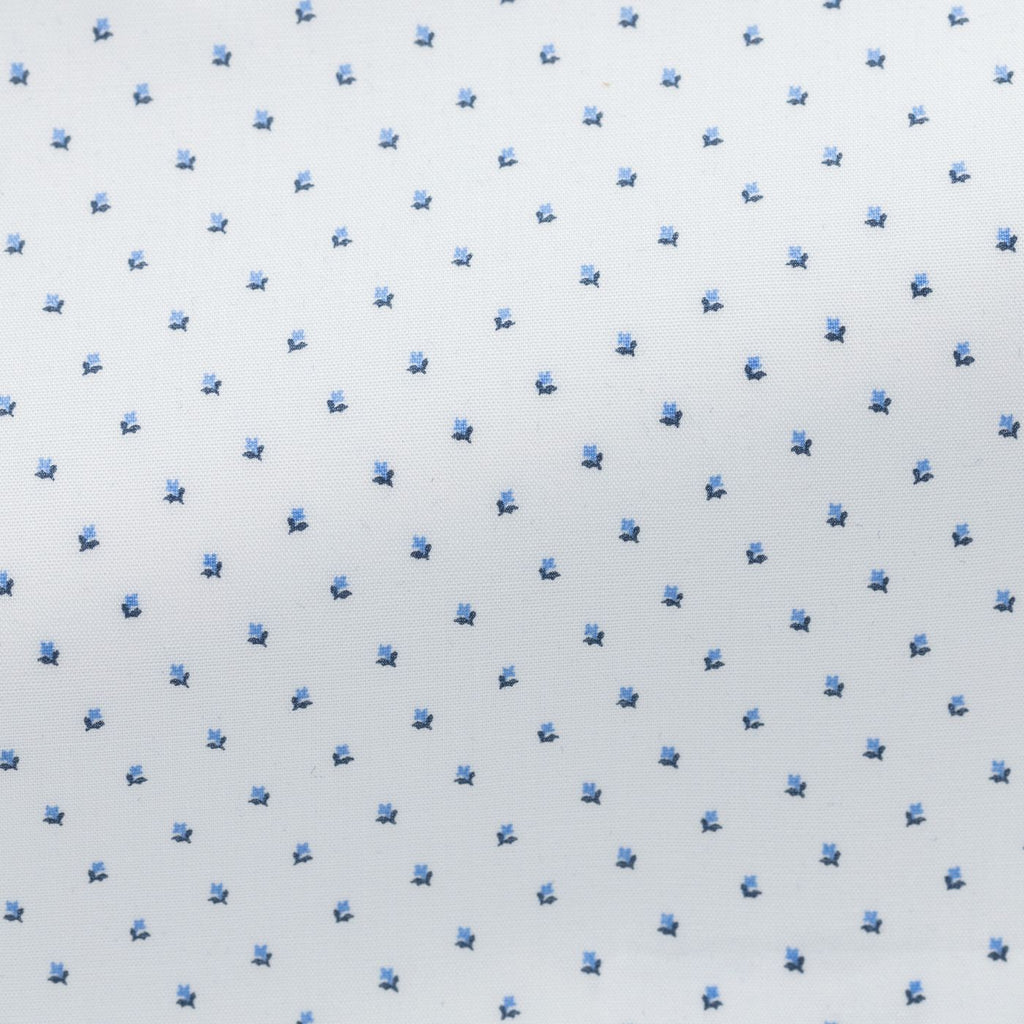 white-cotton-poplin-with-navy-blue-floral-dot-printPL PC05140gr Fabric