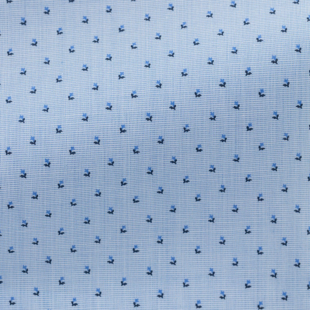 light-blue-cotton-poplin-with-navy-blue-floral-dot-printPL PC05140gr Fabric