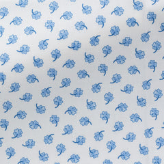 White-Cotton-Poplin-With-Light-Blue-Four-Leaf-CloversPC07160gr Fabric